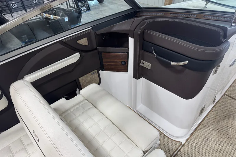 Slide: The Image of Interior of a 2020 Cobalt R5 boat featuring luxurious seating and sleek design elements. - 11