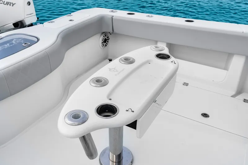 Slide: The Image of Fishing station on 2023 Freeman 37 boat with rod holders and ocean backdrop. - 27