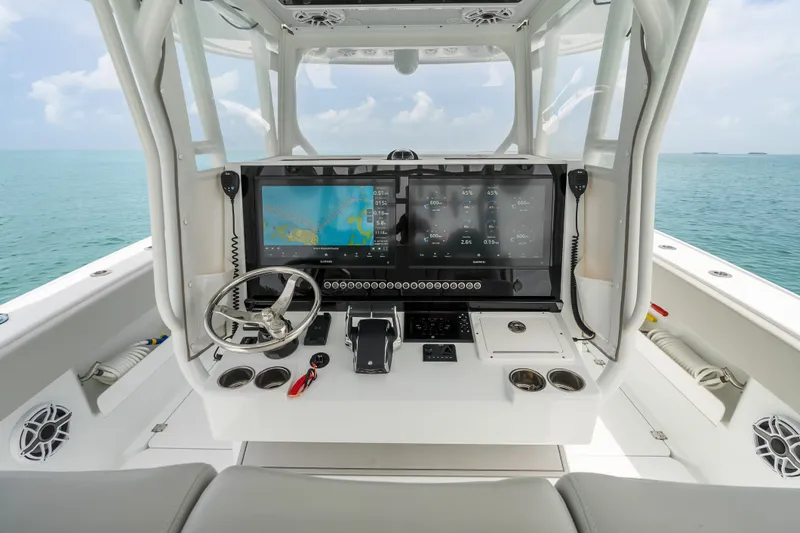 Slide: The Image of Cockpit of 2023 Freeman 37 boat with advanced navigation system and ocean view. - 17