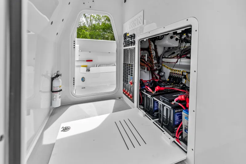 Slide: The Image of Interior view of a 2023 Freeman 37 boat showing electrical panel and wiring. - 44