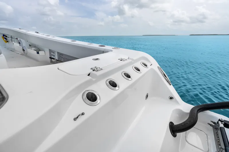 Slide: The Image of Freeman 37 boat deck overlooking serene blue ocean, 2023 model. - 33