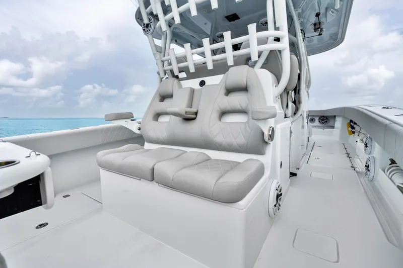 Slide: The Image of Luxury seating on a 2023 Freeman 37 boat, featuring modern design and ocean backdrop. - 26
