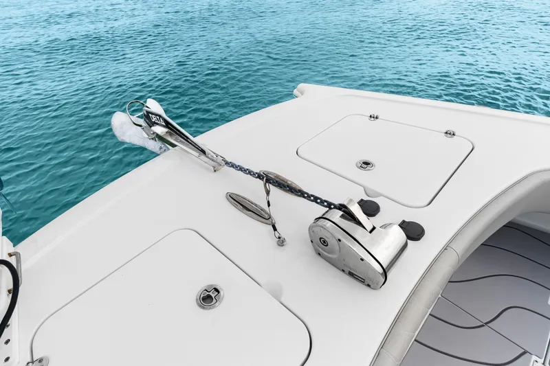 Slide: The Image of Freeman 37 boat deck with anchor and winch, 2023 model, on clear blue water. - 38