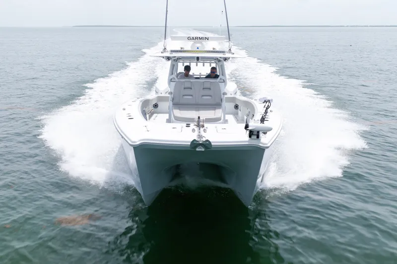 Slide: The Image of 2023 Freeman 37 boat cruising on open water, showcasing sleek design and powerful performance. - 16