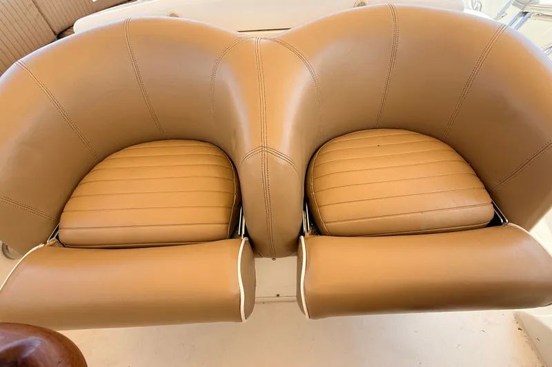 Slide: The Image of Tan leather seats on a 2000 Fairline Squadron 55 yacht. - 23