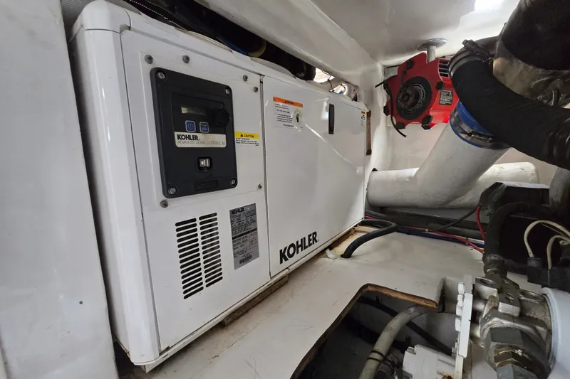 Slide: The Image of Engine room of 2005 Cavileer 44 Convertible with Kohler generator. - 44