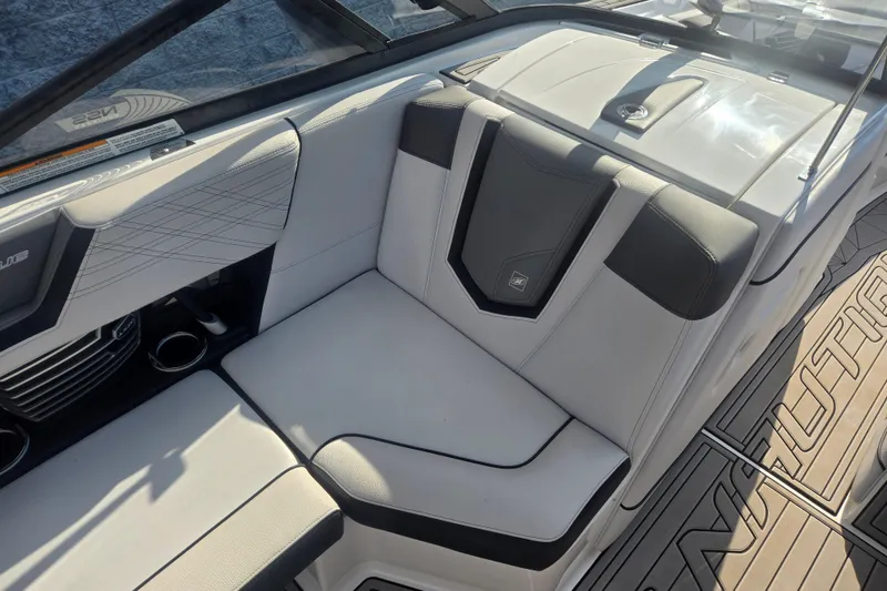 Slide: The Image of 2018 Nautique Super Air Nautique G25 interior seating with sleek design and premium materials. - 7