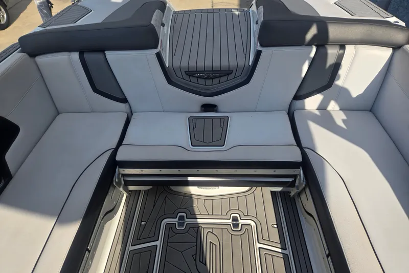 Slide: The Image of Interior seating of 2018 Nautique Super Air Nautique G25 boat, featuring sleek design and premium materials. - 10