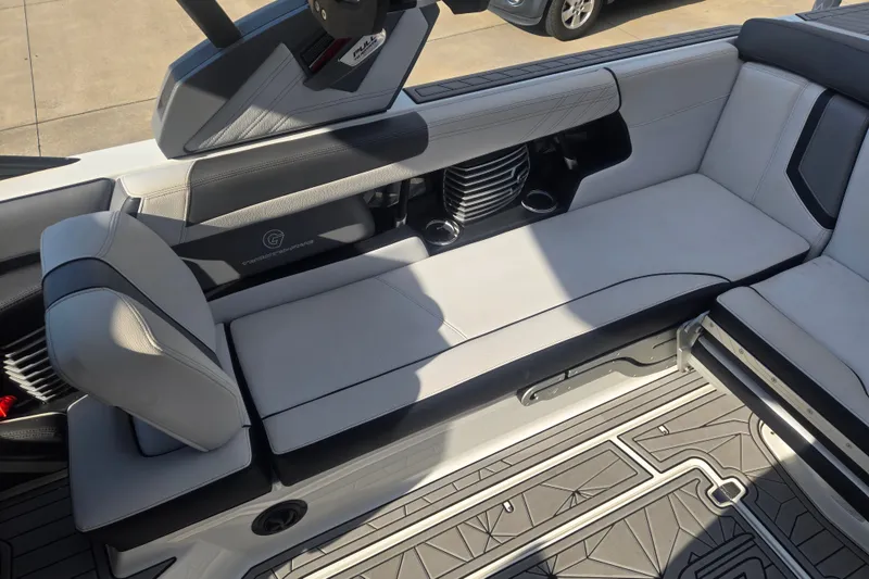 Slide: The Image of 2018 Nautique Super Air Nautique G25 interior with sleek, modern seating and stylish design. - 11