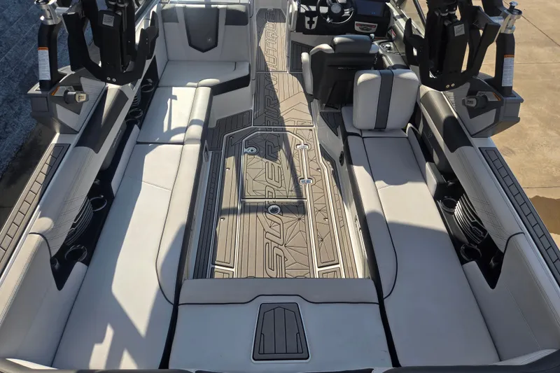 Slide: The Image of 2018 Nautique Super Air Nautique G25 interior with luxurious seating and modern design. - 15