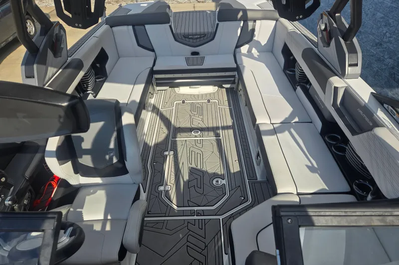 Slide: The Image of 2018 Nautique Super Air Nautique G25 interior with sleek seating and modern design. - 6