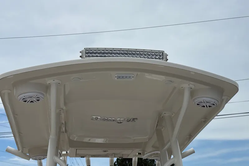 Slide: The Image of 2024 Ranger 2360 Bay boat top view with speakers and light bar. - 40