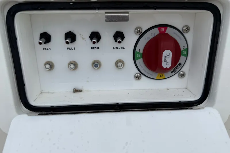 Slide: The Image of Control panel of 2024 Ranger 2360 Bay boat with switches and dial. - 35