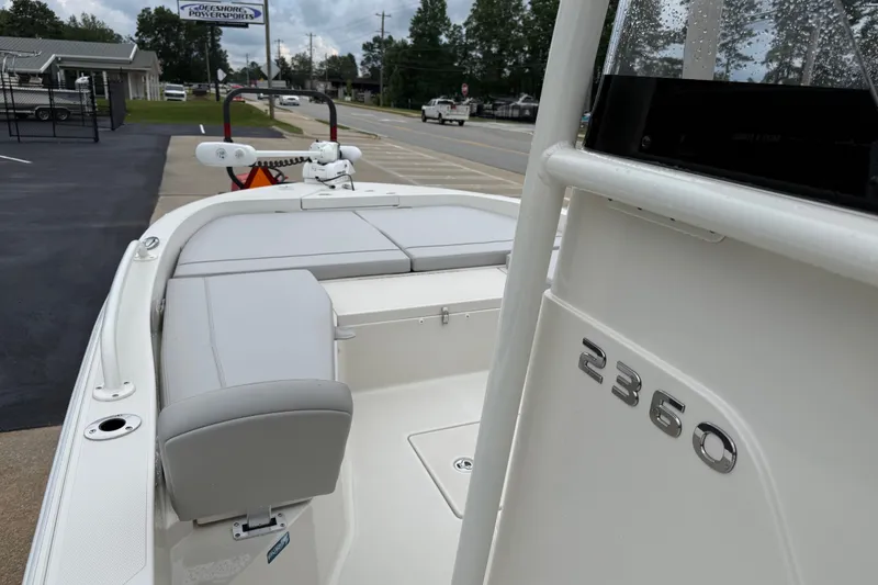 Slide: The Image of 2024 Ranger 2360 Bay boat with sleek design and comfortable seating. - 28