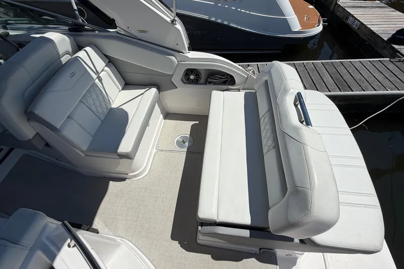 Slide: The Image of 2023 Regal 28 Express boat interior with luxurious seating and modern design. - 8