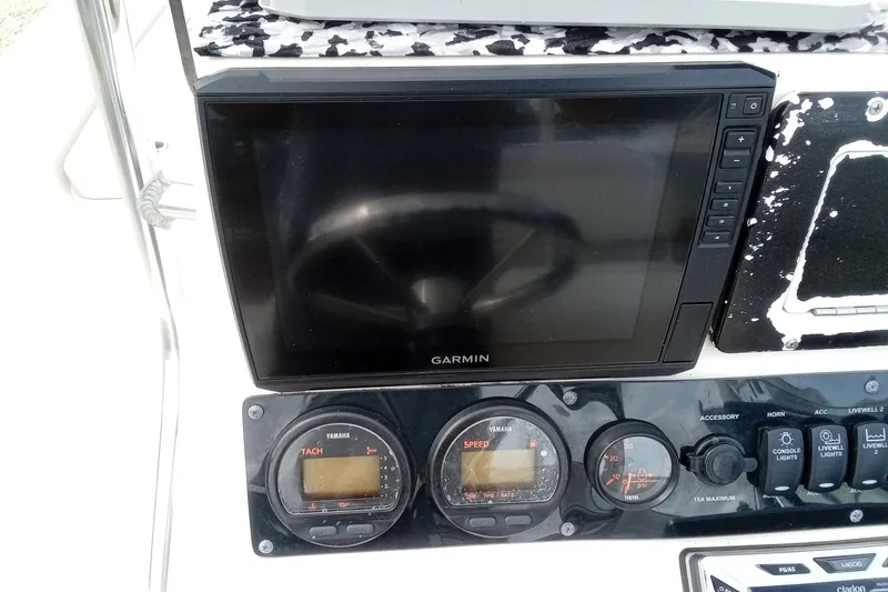 Slide: The Image of Console of 2006 Pathfinder 2200 Tournament Edition with Garmin display and Yamaha gauges. - 24