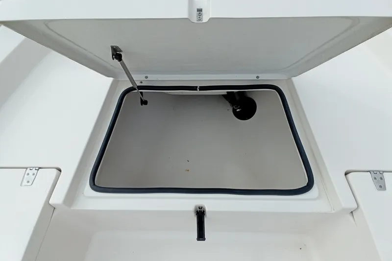 Slide: The Image of Open storage compartment on a 2006 Pathfinder 2200 Tournament Edition boat. - 19