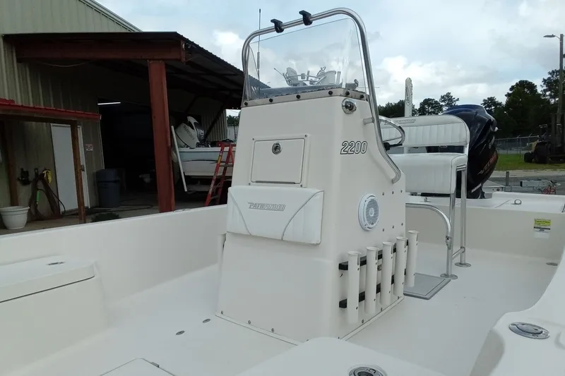 Slide: The Image of 2006 Pathfinder 2200 Tournament Edition boat interior with console and seating. - 12