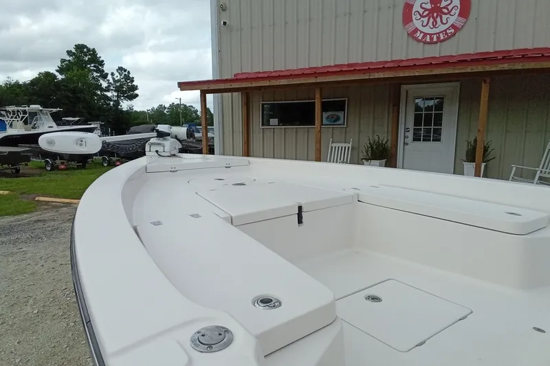 Slide: The Image of 2006 Pathfinder 2200 Tournament Edition boat displayed outside a building. - 11