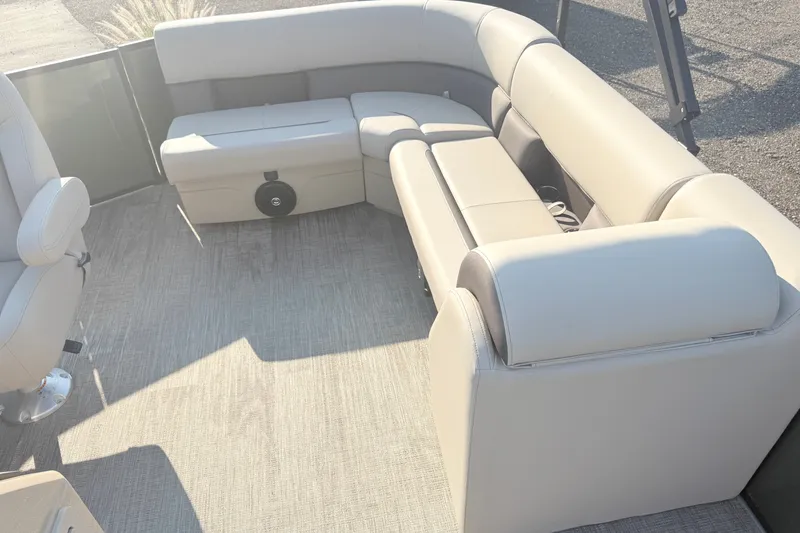 Slide: The Image of Luxurious seating on 2027 Bentley Pontoons LE 180CR, featuring plush beige upholstery. - 16
