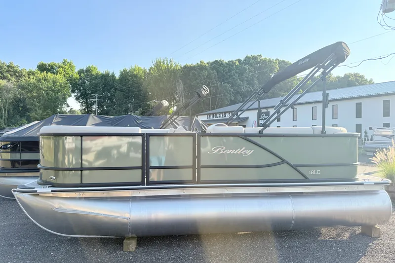 The Image of 2027 Bentley Pontoons LE 180CR pontoon boat in a sunny outdoor setting. - 0