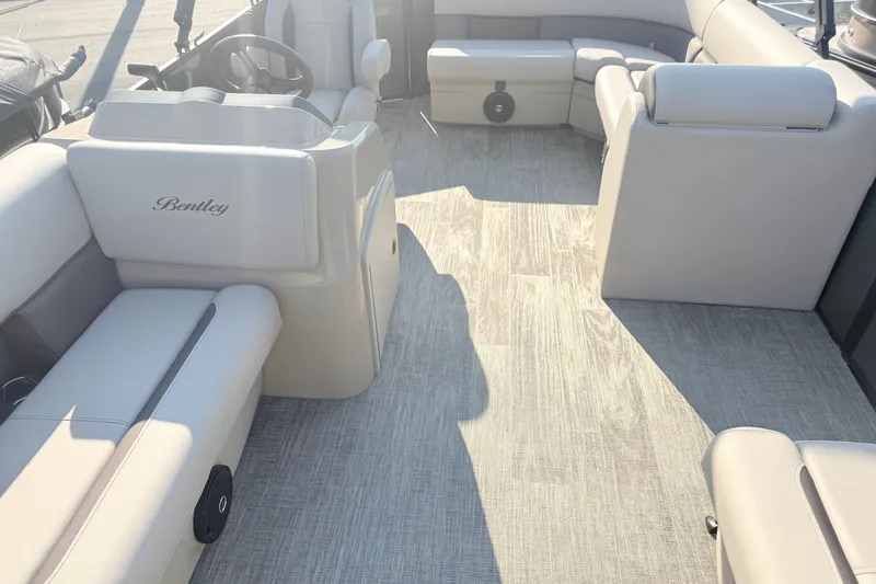 Slide: The Image of Interior of 2027 Bentley Pontoons LE 180CR, featuring luxurious seating and modern design. - 18