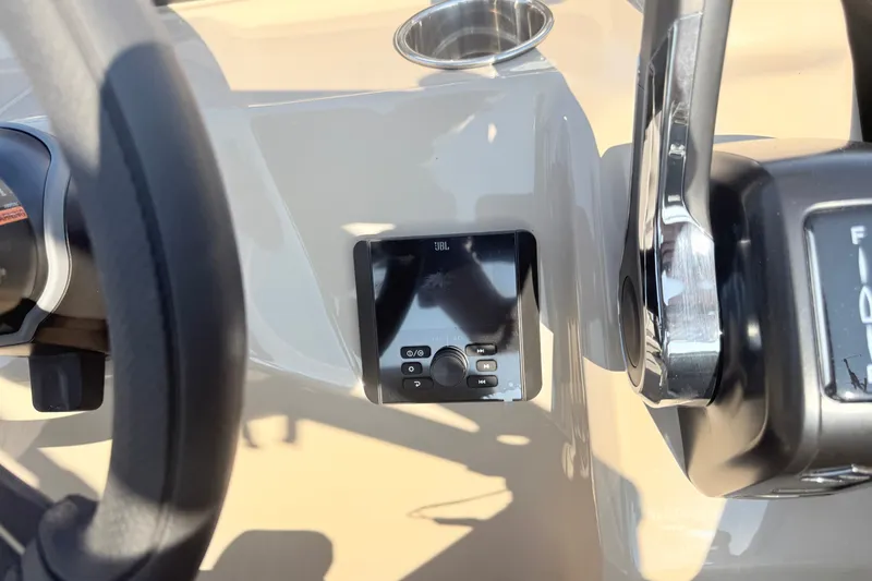 Slide: The Image of Steering console of 2027 Bentley Pontoons LE 180CR with JBL audio controls. - 10