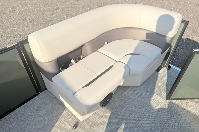 Slide: The Image of Luxurious seating on 2027 Bentley Pontoons LE 180CR with cup holders and modern design. - 13