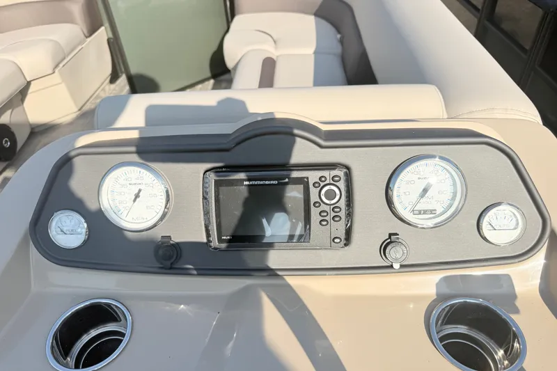 Slide: The Image of Dashboard of 2027 Bentley Pontoons LE 180CR with gauges and controls. - 11