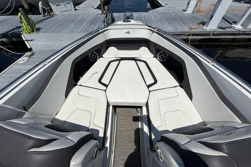Slide: The Image of 2018 Monterey 298SS Super Sport boat interior with white seating and sleek design. - 32