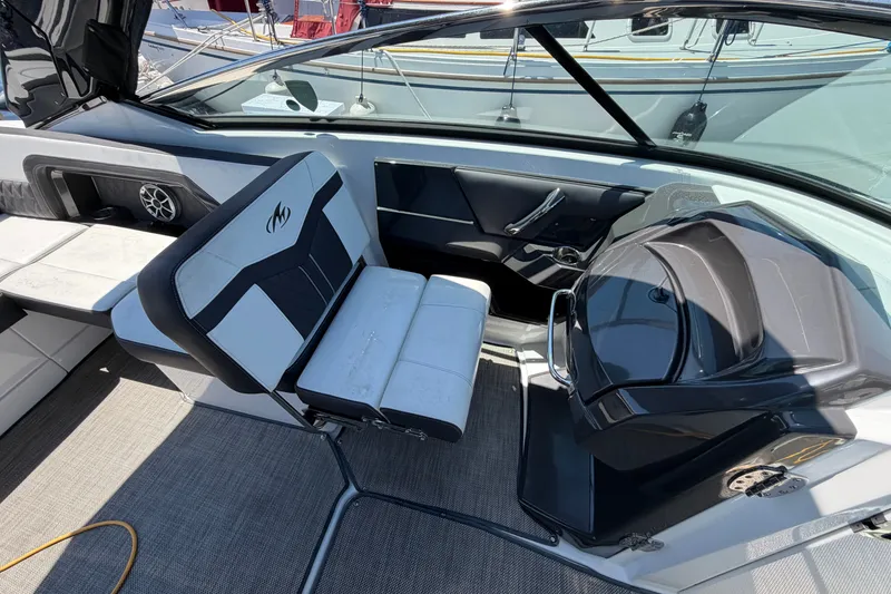 Slide: The Image of 2018 Monterey 298SS Super Sport boat interior with sleek seating and modern dashboard. - 20