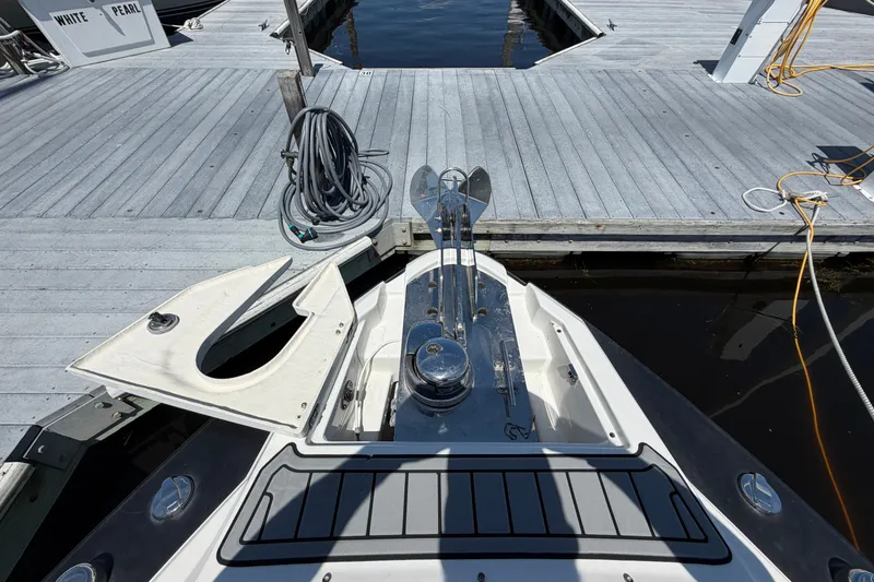 Slide: The Image of 2018 Monterey 298SS Super Sport boat docked at marina with open hatch. - 36
