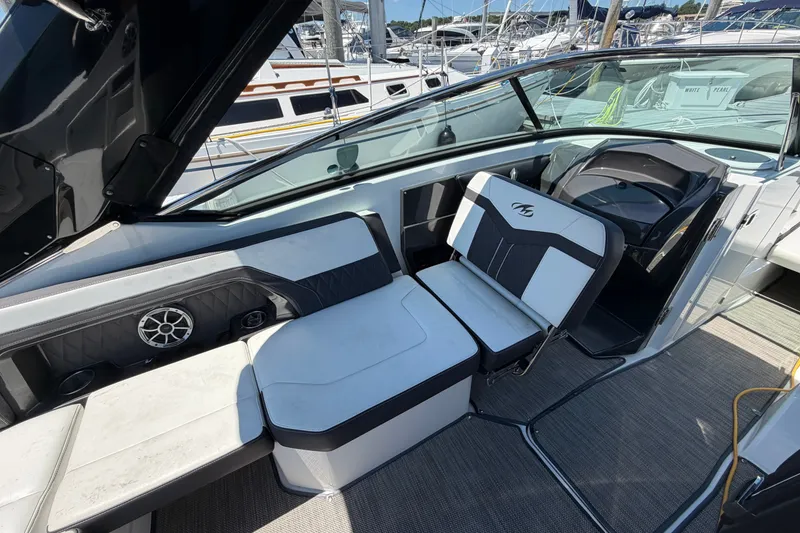 Slide: The Image of 2018 Monterey 298SS Super Sport boat interior with sleek seating and modern design. - 21