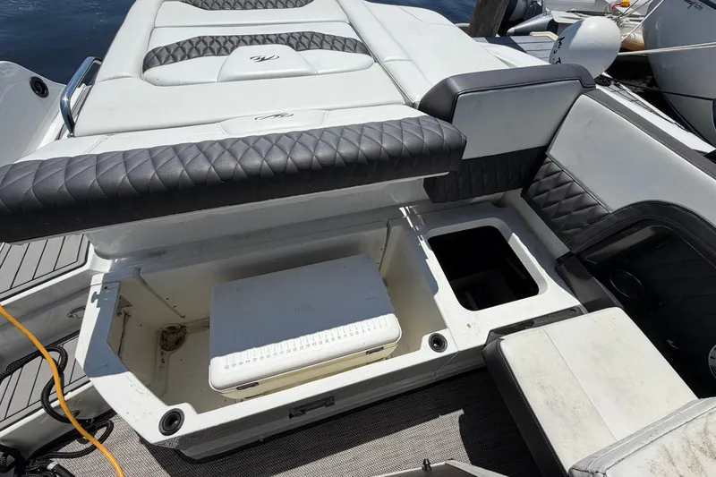 Slide: The Image of 2018 Monterey 298SS Super Sport boat interior with open storage compartments. - 13