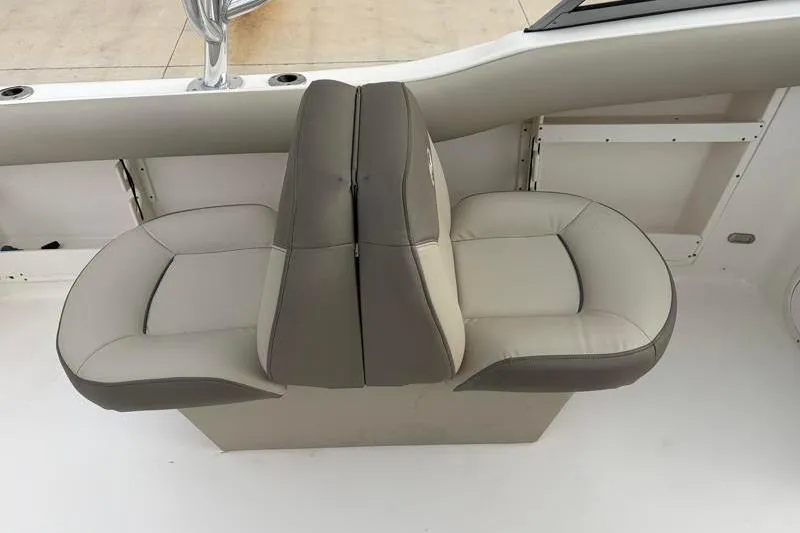Slide: The Image of 2024 Key West 239 DFS boat seating, featuring dual-tone cushioned seats and sleek design. - 26