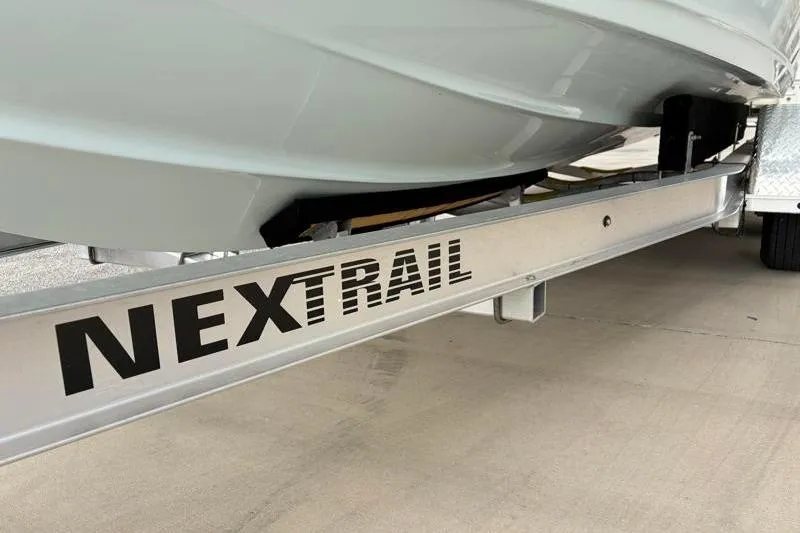 Slide: The Image of 2024 Key West 239 DFS boat on NexTrail trailer, close-up view. - 34