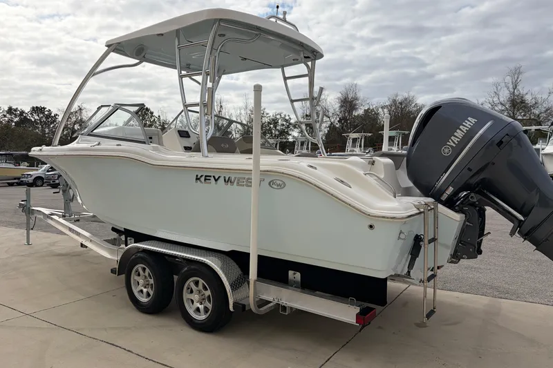 Slide: The Image of 2024 Key West 239 DFS boat on trailer with Yamaha outboard motor. - 5