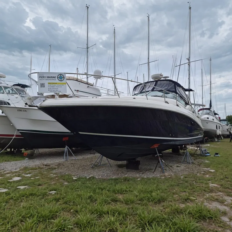 The Image of 2005 Sea Ray 340 Sundancer yacht on stands at Pier-1 Marine Yacht Brokerage. - 0