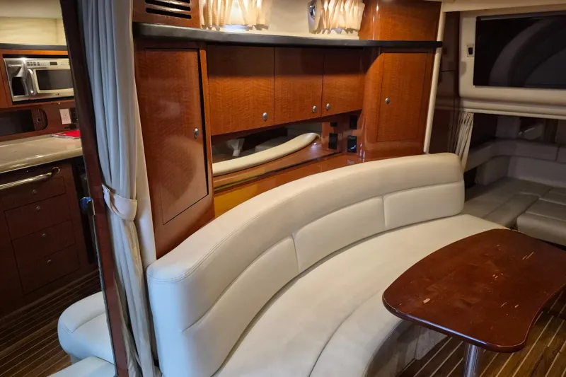 Slide: The Image of Luxurious interior of a 2005 Sea Ray 340 Sundancer yacht with elegant seating and cabinetry. - 17
