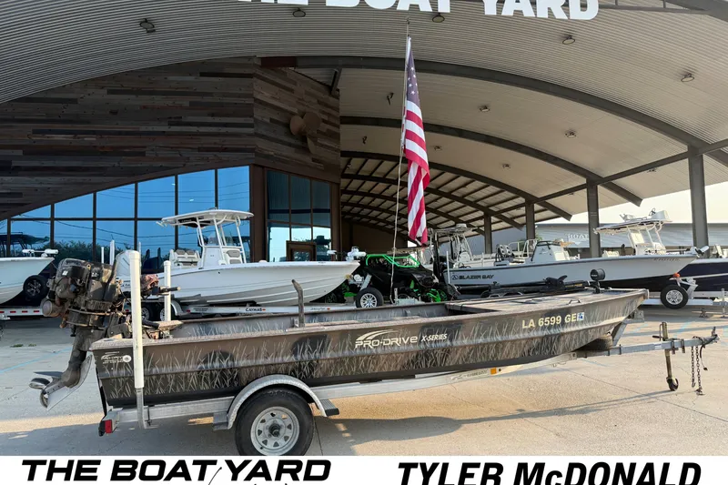 The Image of 2015 Custom Pro Drive 1754 boat on trailer at The Boat Yard dealership. - 1