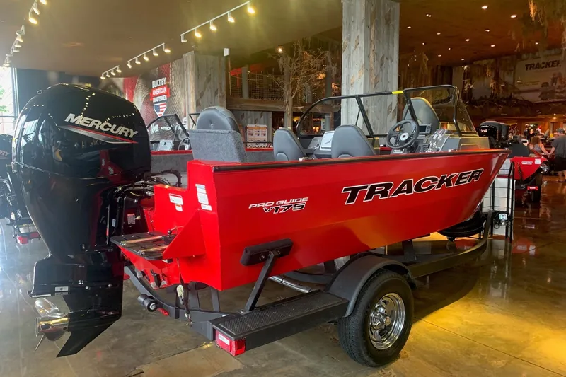The Image of 2026 Tracker Pro Guide V-175 WT boat with Mercury engine in showroom display. - 0