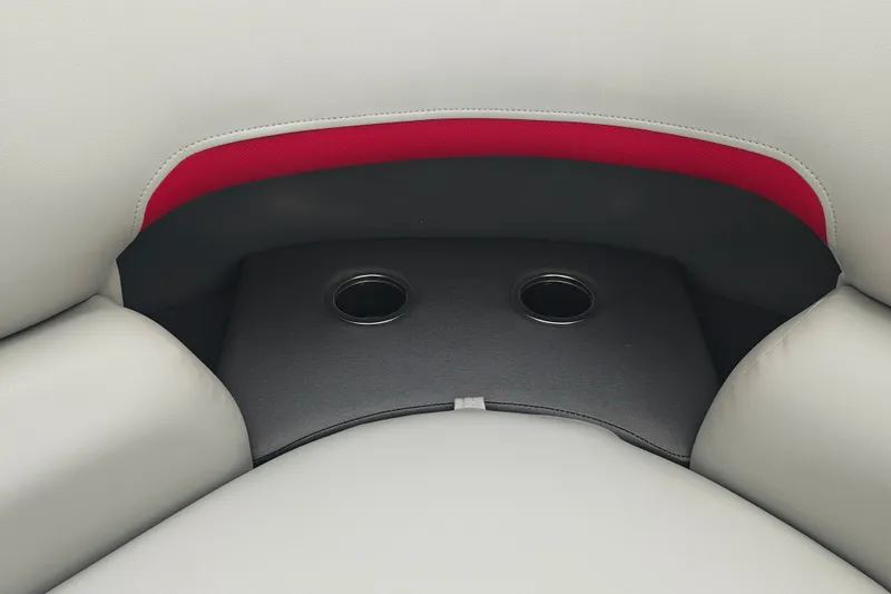 Slide: The Image of 2026 Sun Tracker Party Barge 20 DLX seating with cup holders and red accent. - 14