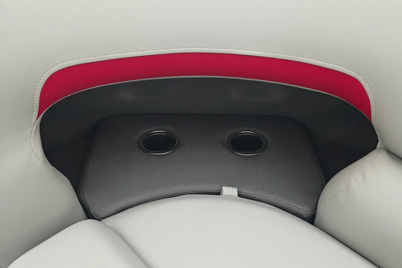 Slide: The Image of 2026 Sun Tracker Party Barge 20 DLX seating with cup holders and red accent. - 25