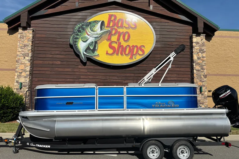 The Image of 2026 Sun Tracker Party Barge 20 DLX pontoon boat at Bass Pro Shops. - 0