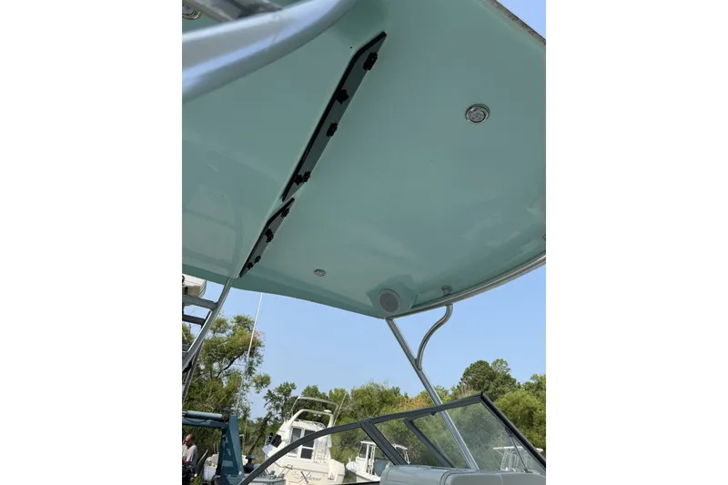 Slide: The Image of 2023 Key West 239 DFS boat canopy with sleek design and integrated lighting. - 8