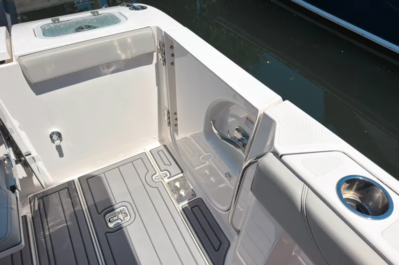Slide: The Image of 2022 Pursuit S 288 Sport boat interior with sleek seating and cup holders. - 17