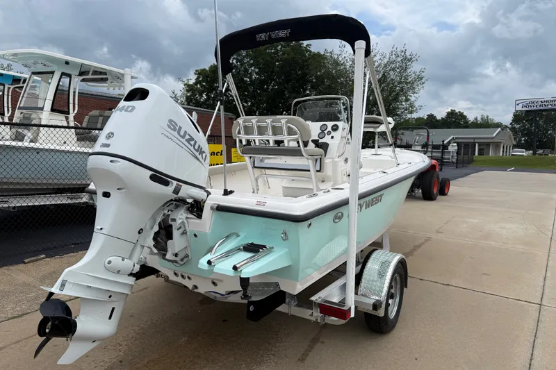 Slide: The Image of 2027 Key West 188 Bay Reef boat with Suzuki engine on trailer. - 7