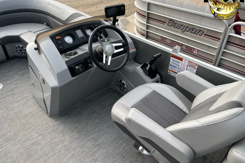 Slide: The Image of 2020 Bennington SX 22 SLX boat interior with steering console and seating. - 6