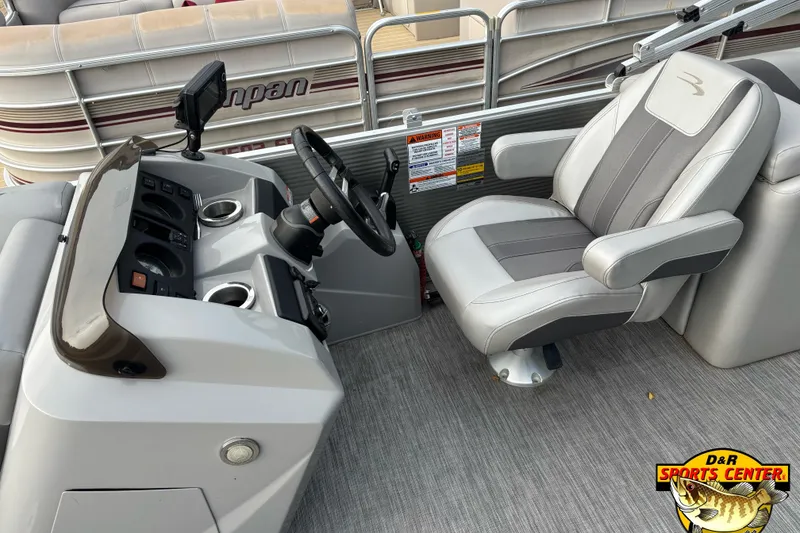 Slide: The Image of 2020 Bennington SX 22 SLX boat interior with steering console and captain's chair. - 8