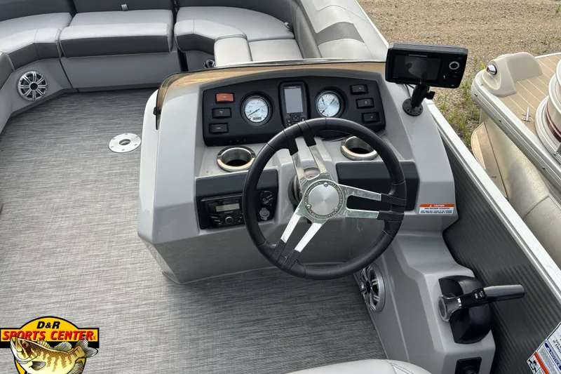 Slide: The Image of 2020 Bennington SX 22 SLX boat interior with steering wheel and control panel. - 5